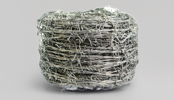 Barbed wire is a fencing material with metal strands containing sharp barbs or points. It creates a ...