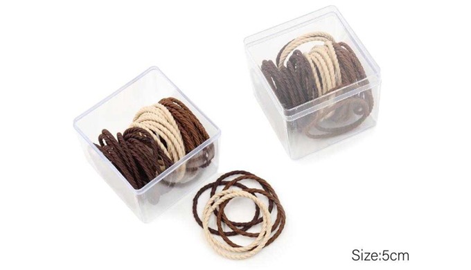 A set of hair bands in brown and black tones, available in various designs and thicknesses. Made fro...