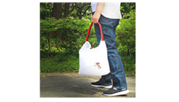 The rolled-up Taekwondo belt transforms into a Ecobag when the belt is unfolded - The Taekwondo Ecob...