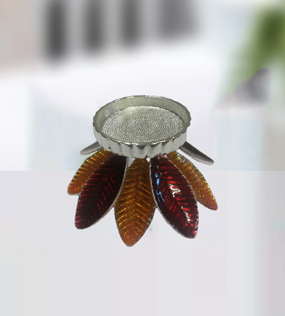 This T- light holder is indeed a beauty defined.The floral leaf sunrays colored design adds grace to...