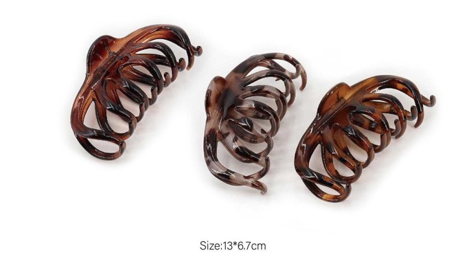 A set of hair claws in various designs, ranging from classic brown tones to matte pastel colors. Lig...
