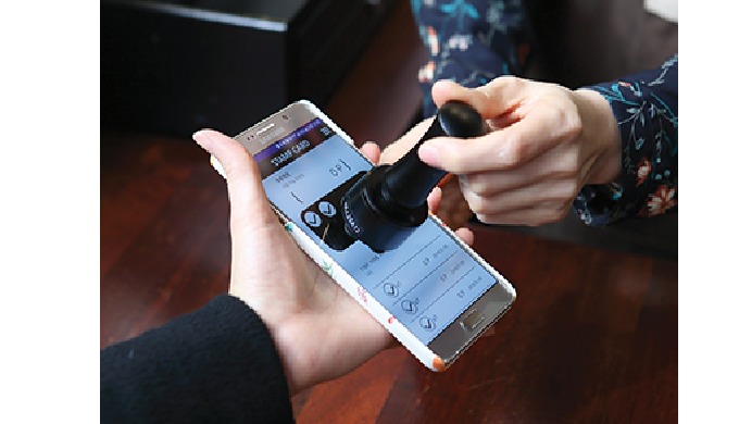 It is a stamp working on the smartphones. The digital stamp sends an encrypted identification signal...