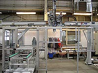 Portálový zakladač s jednou svislou osou