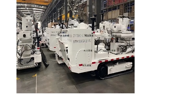 Deep hole drilling vehicles used in coal mines belong to tracked self-propelled, low speed, high tor...