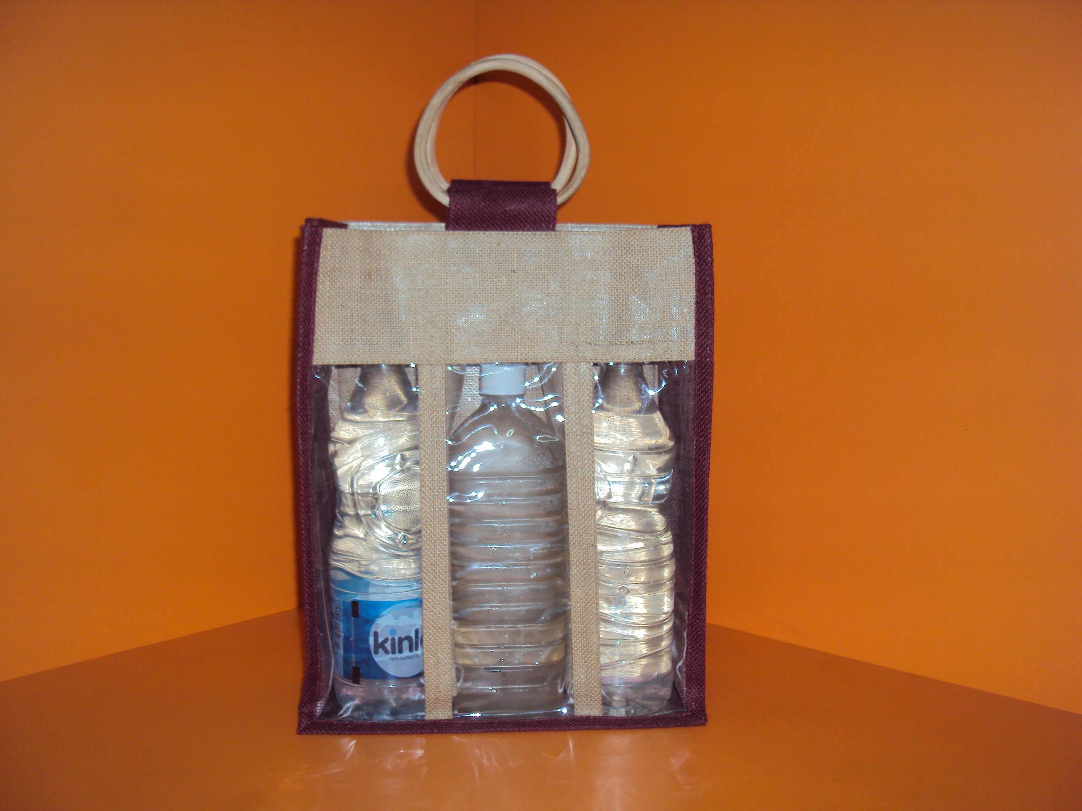The demand for jute bags seems to be growing every year and this three bottle jute bag version with ...
