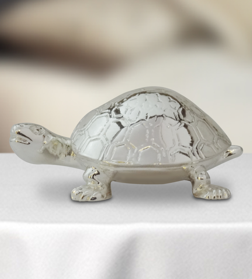 This glossy silver plated turtle serves as an excellent piece of home décor.Place at any part of yor...