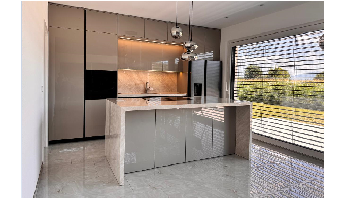 Modern elegance crafted to perfection. This kitchen is designed to bring harmony between luxury, fun...