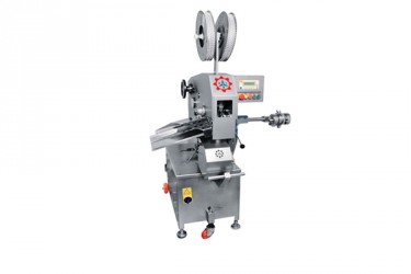 OKM - 34100, şerli motorlu olup suni bağırsağa dolumu yapılmış mamulün her iki açık tarafından metal...