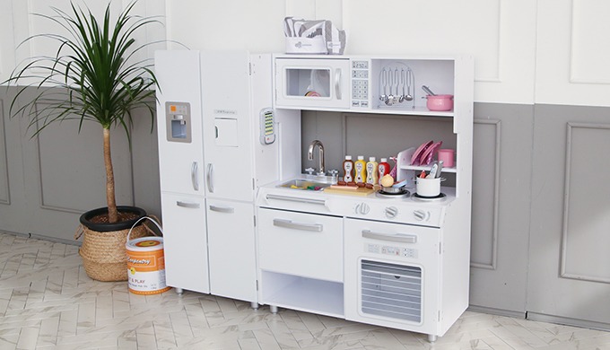 white wooden play kitchen