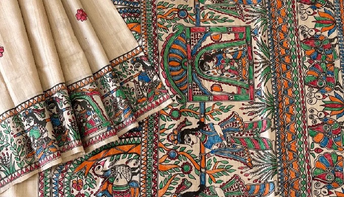 Adorn timeless elegance with our fully hand-painted madhubani tussar sarees with natural dye colors ...
