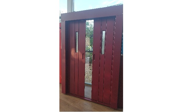 Puertas correderas automáticas de apertura central para montacargas