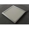 Ce panneau dalle LED ultraplat 30x30 cadre alu blanc chaud peut être fixé au plafond ou sur un mur o...
